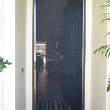 Arched Single Front Door StowAway Retractable Screen