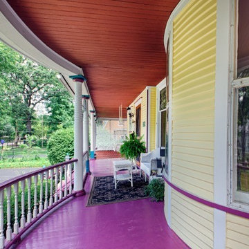 wraparound porch beckons you to sit a while!