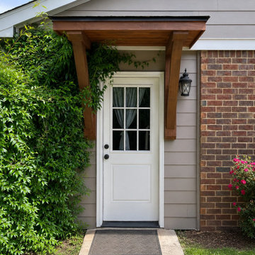 Side door bracket portico