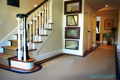 Entryway - traditional medium tone wood floor entryway idea in Other with beige walls