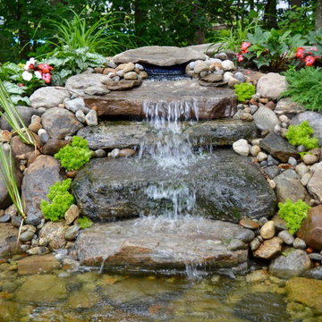 Pond with Bluestone Patio and Pennsylvania Flat Wall
