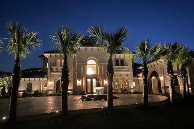 This is an example of a mediterranean home design in Dallas.