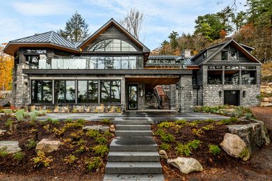 Example of a mountain style home design design in Toronto