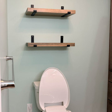 Bathroon Remodel with Hearth Stained Vanity, Tiled Shower and Intelligent Toilet
