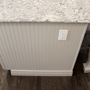 White Kitchen with Gray and Black Quartz Countertop and Bar Area ~ Streetsboro