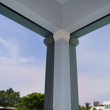 Built in Titan Screens on lanai with outdoor kitchen in Naples, Florida