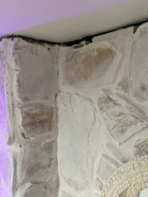 How to fill gap between stone fireplace and ceiling