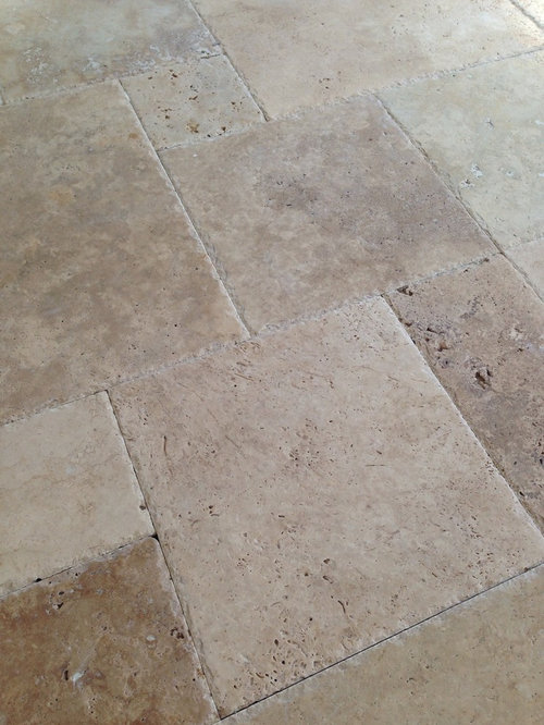 Travertine patio-fill holes or not?