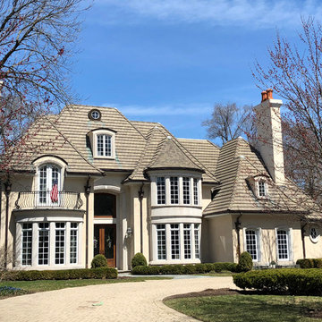 dryvit finish replaced with stucco and limestone in Hinsdale