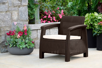 Example of a mid-sized classic backyard patio design
