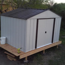 metal shed with raised foundation & ramp