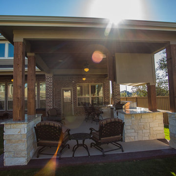 Uniquely Beautiful Covered Patio with a Fire Table