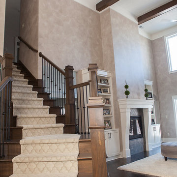 Custom staircase with wrought iron balusters