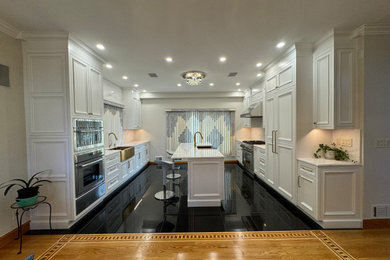 Mid-sized elegant galley porcelain tile and black floor eat-in kitchen photo in New York with a farmhouse sink, recessed-panel cabinets, white cabinets, quartz countertops, white backsplash, quartz backsplash, paneled appliances, an island and white countertops