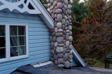 Stone chimney, porch, sidewalk