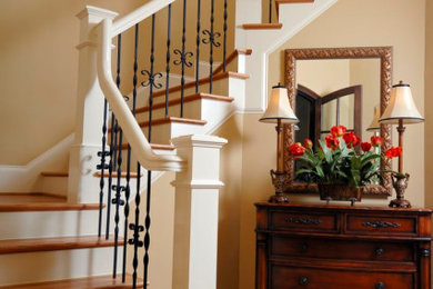 Staircase - mid-sized traditional wooden l-shaped wood railing staircase idea in Chicago with wooden risers
