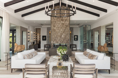 Living room - coastal formal beige floor living room idea in Tampa with gray walls and a two-sided fireplace