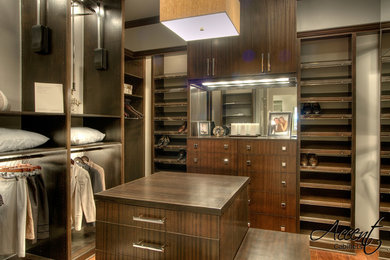Traditional storage and wardrobe in Houston with medium wood cabinets.