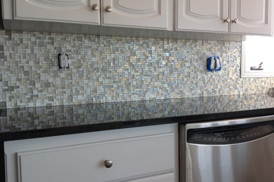 Open concept kitchen - traditional single-wall open concept kitchen idea in Other with an undermount sink and granite countertops