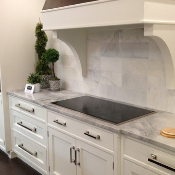QCCI White Painted Cabinetry and Walnut Hood