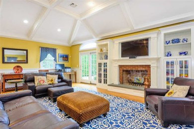 Family Room with Built in Cabinets & Coffered Ceilings