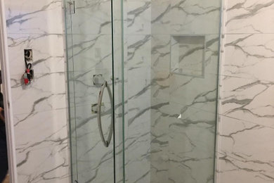 Marble look Tiles with Framless Glass Shower