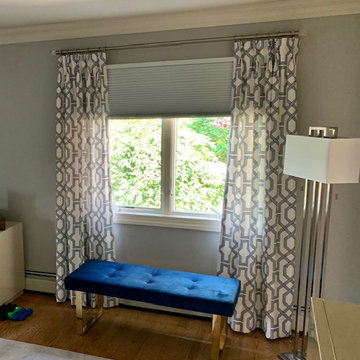 Pinch Pleat Drapes in Geometric Fabric over Norman Room Darkening Cellular Shade