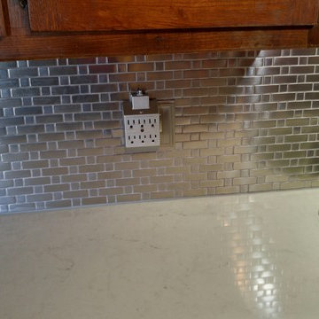 London Grey Caesarstone with Stainless Steel Backsplash