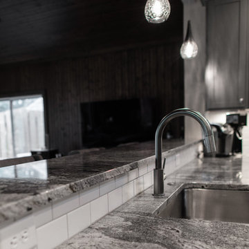Kitchen remodel with granite and subway tile backsplash