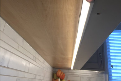Example of a trendy kitchen design in Calgary