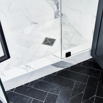 Duboce Triangle Flat - Master Bathroom detail of 2-tone herringbone marble floor