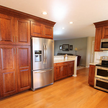Kitchen Remodel with Medallion Cherry Raised Panel Cabinets & Quartz Countertop