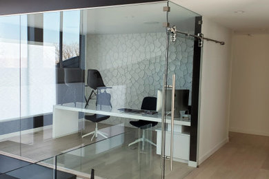Example of a trendy home office design in Other
