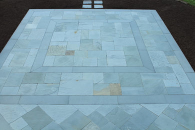 Patio kitchen - mid-sized traditional backyard stone patio kitchen idea in New York with no cover