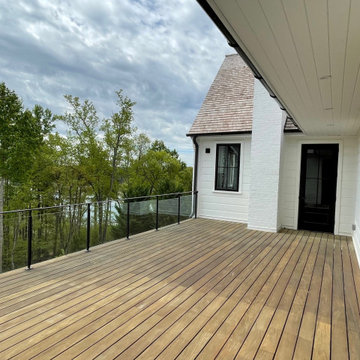 Roof deck connecting two wings of the home, overlooking the pool and Lake Lanier
