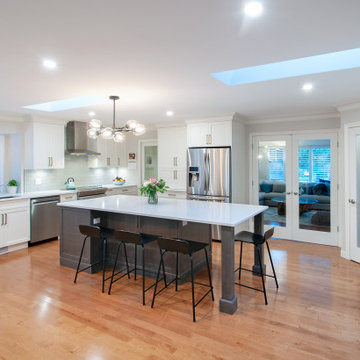 Transitional Kitchen Renovation with Two-Tone Island & Open Concept