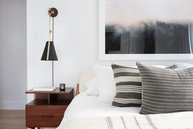 Example of an eclectic bedroom design in New York