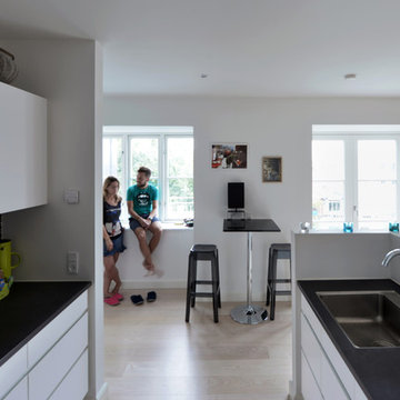 Transformation af gammelt smedjehus til bylejligheder