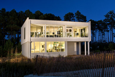 Mid-sized contemporary white two-story exterior home idea in Richmond
