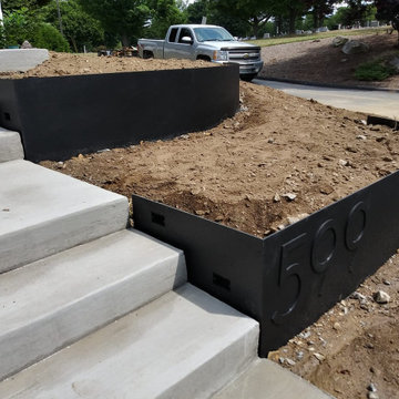 Curved Iron Planter Boxes with address