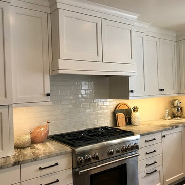 in thier new white kitchen