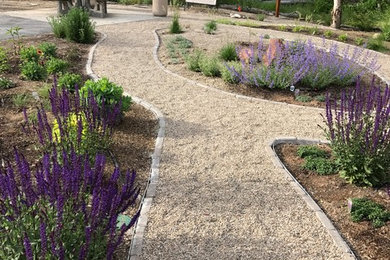 Photo of a large victorian full sun gravel formal garden in Boise for summer.