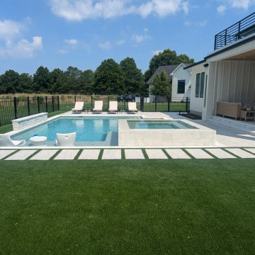 Lewes, DE - Modern, Clean Line Pool with Large Tanning Ledge & Elevated Spa