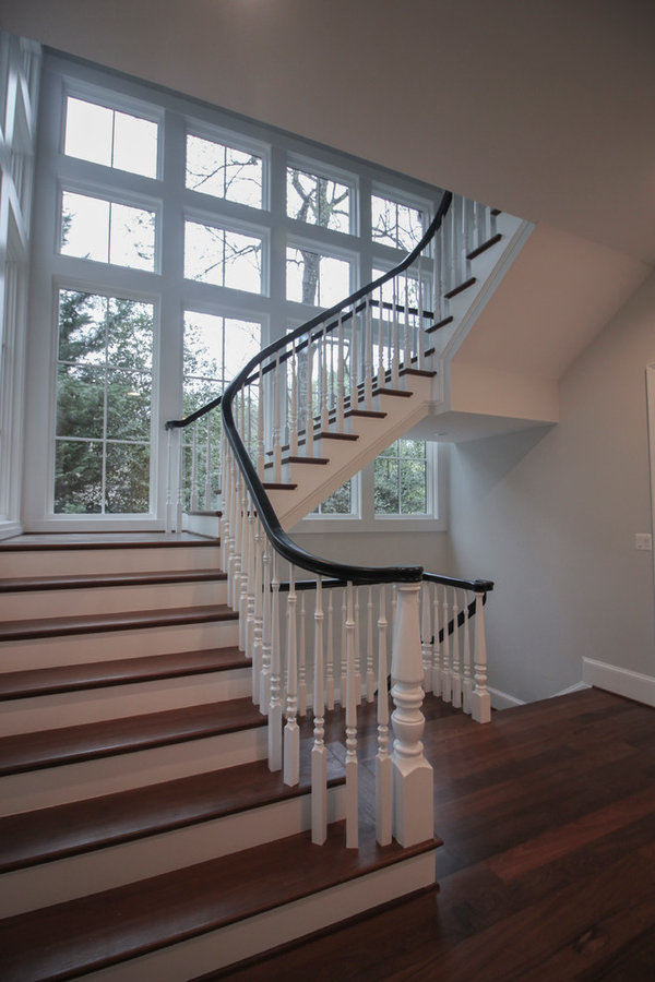 Powerful Impression by Floating Staircase in Suburban Foyer