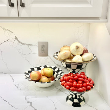 Ivory White Kitchen With Marble Look Quartz Counters and Splash