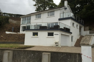 Design ideas for a medium sized contemporary balcony in Other.