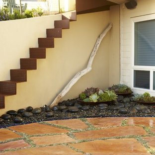 Design ideas for a coastal courtyard stone landscaping in San Luis Obispo.