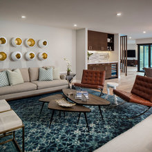 8 Extraordinary Ways to Decorate the Wall Behind a Sofa