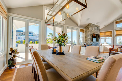 Design ideas for a beach style dining room in Other.