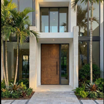 Custom Mahogany Hurricane-Rated Pivot Door | Miami, FL